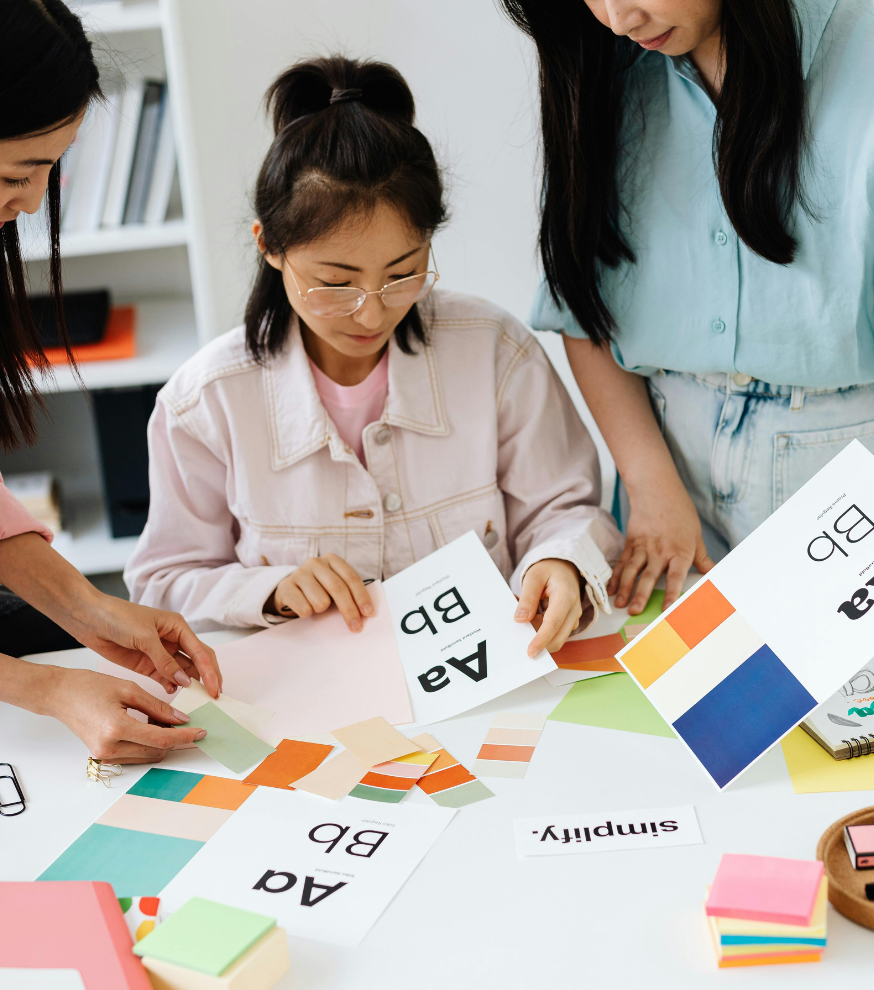 Creative designers working on corporate brand identity in office