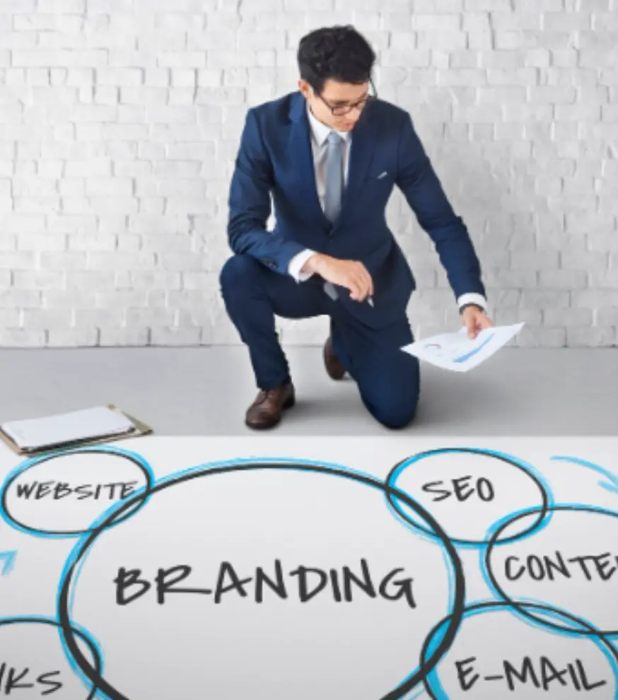 Creative branding workspace with logo design materials