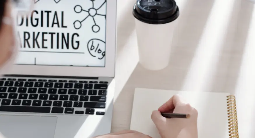 Young professional learning digital marketing skills using a laptop